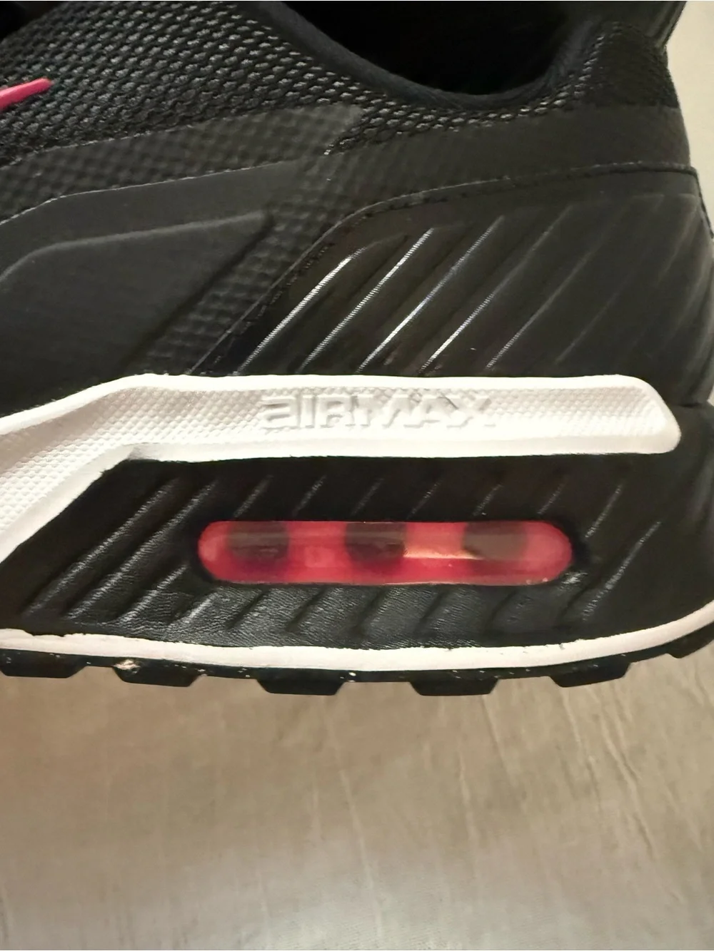 Nike Women's Black Athletic Shoes with Pink Swoosh